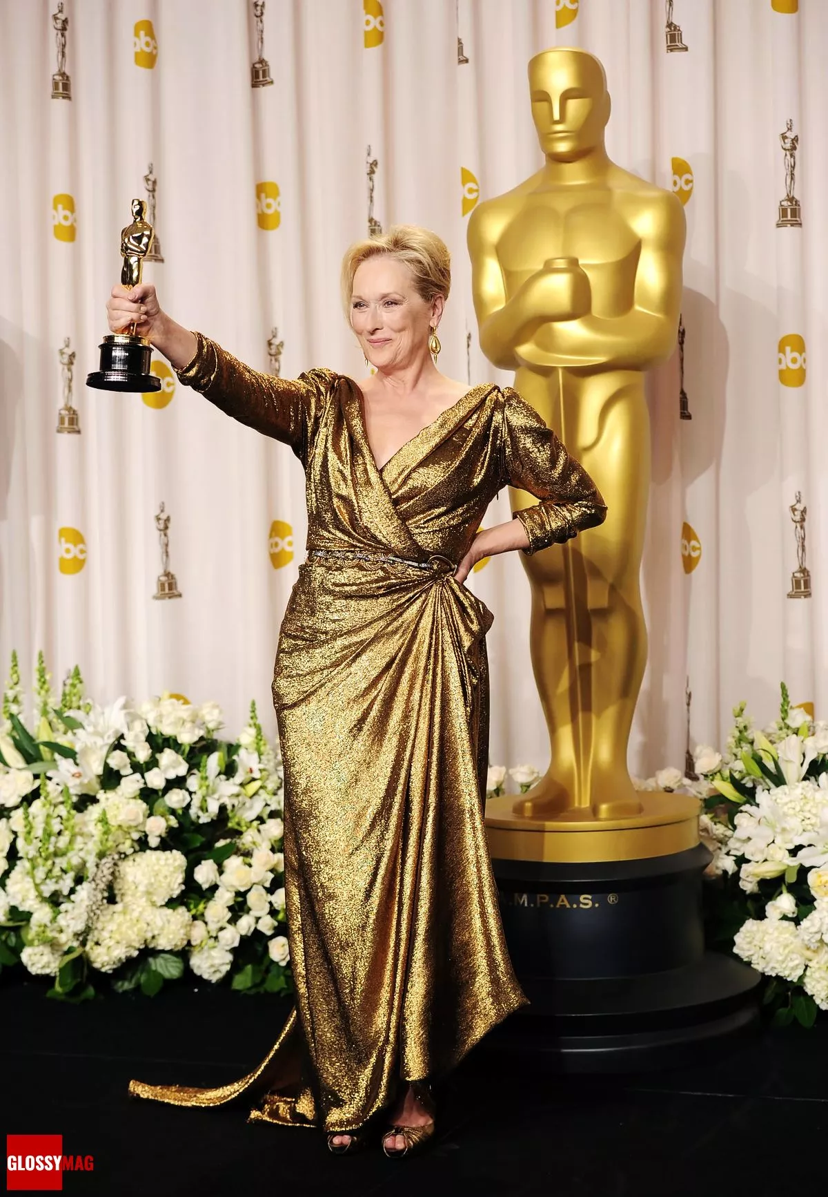 Мерил Стрип на церемонии вручения премии «Оскар» в золотом платье, созданном Эльбазом, 2012 г.