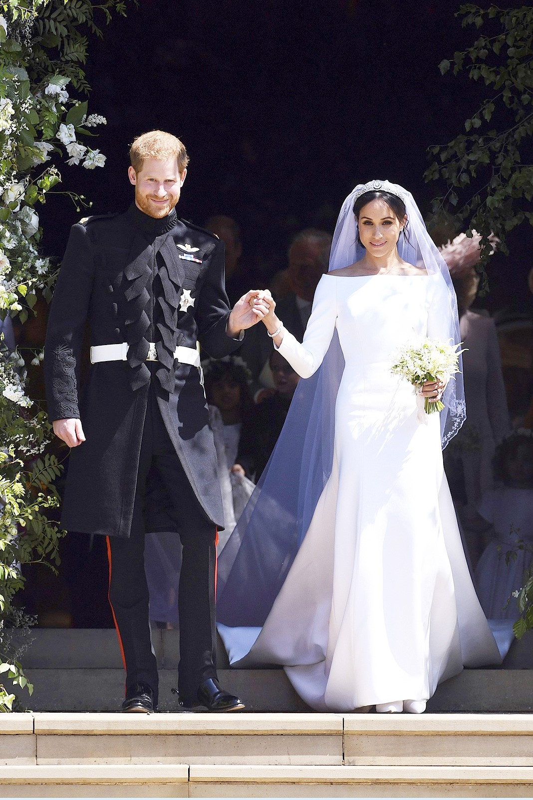 Актриса и принца Гарри выходят из часовни Святого Георгия в Виндзорском замке, 19 мая 2018 г.