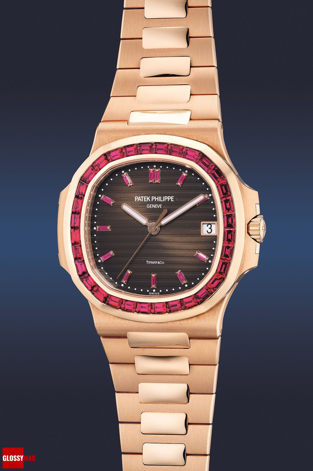 Часы Patek Philippe Nautilus Ref. 5723/112R-001 в корпусе из розового золота с ободком, украшенным рубинами багетной огранки, фото 1